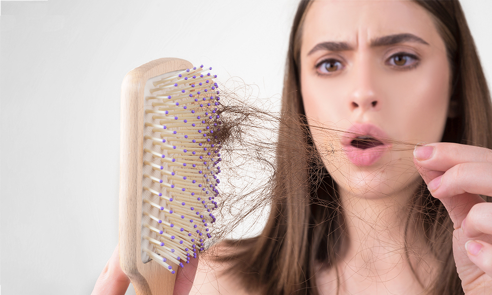Как остановить выпадение волос и ускорить их рост